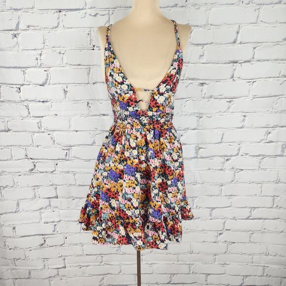 Urban Outfitters Dresses & Skirts - Urban Outfitters Naomi Strappy Back mini dress with a floral print Womens L Y2k